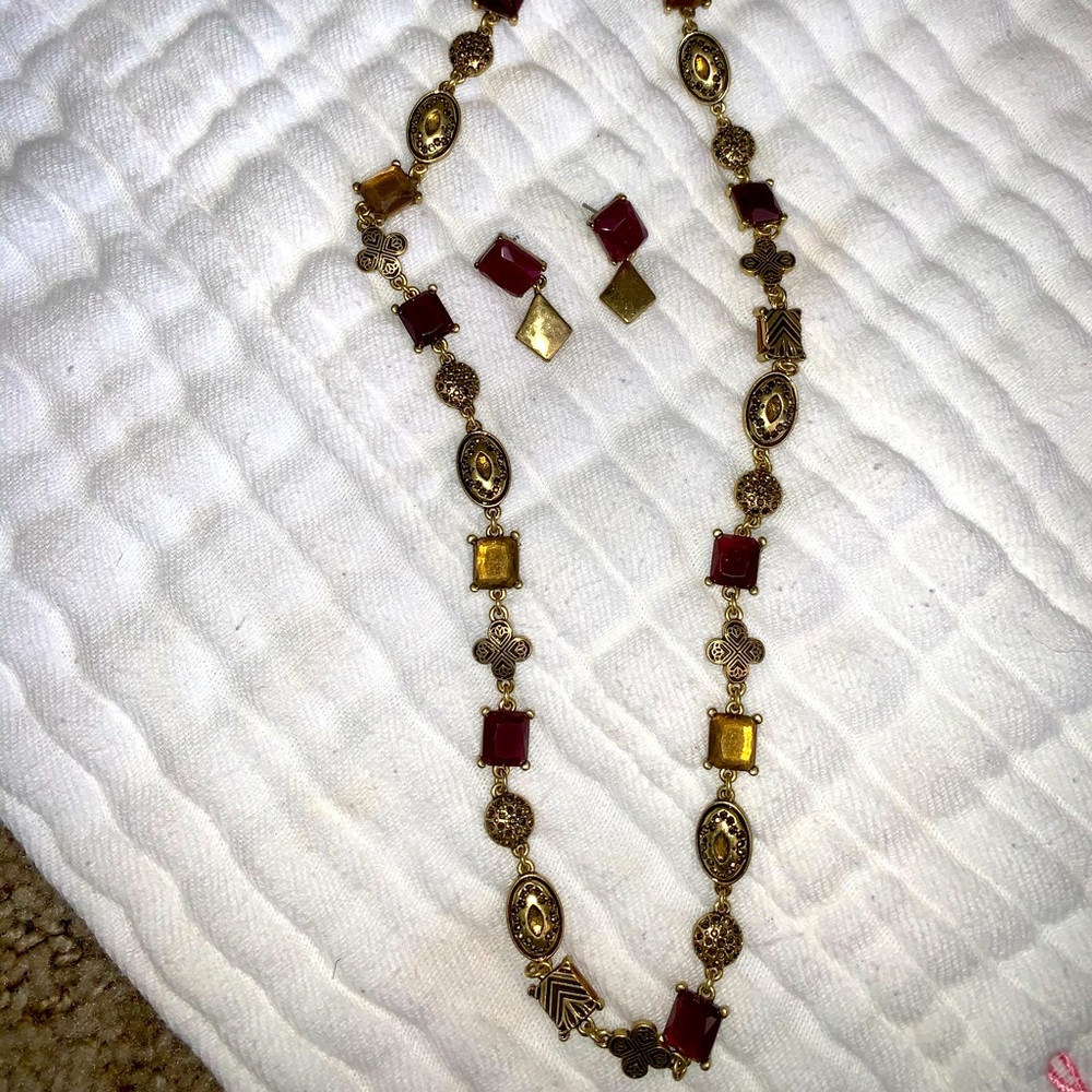 Gold tone necklace and earrings set.